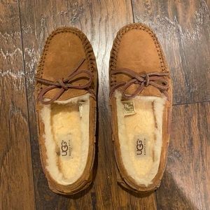 Brand new Ugg moccasin slippers. Sat in storage, never worn!! Chestnut brown.
